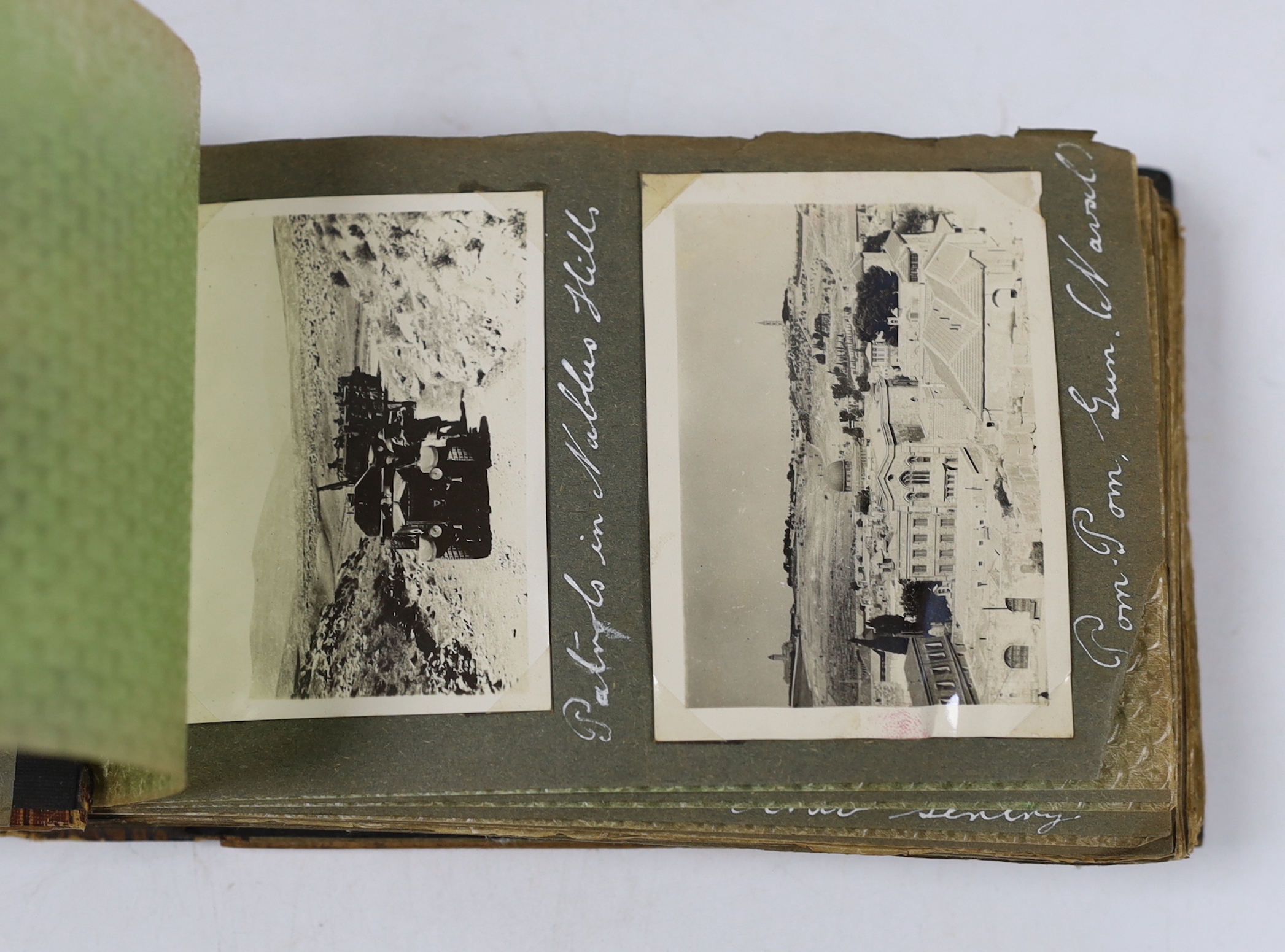 Two photographs albums; an album of early 20th century Middle Eastern travel photographs, together with a 1940s album of mainly naval photographs including war ships and aircraft carriers, some with descriptions on the r